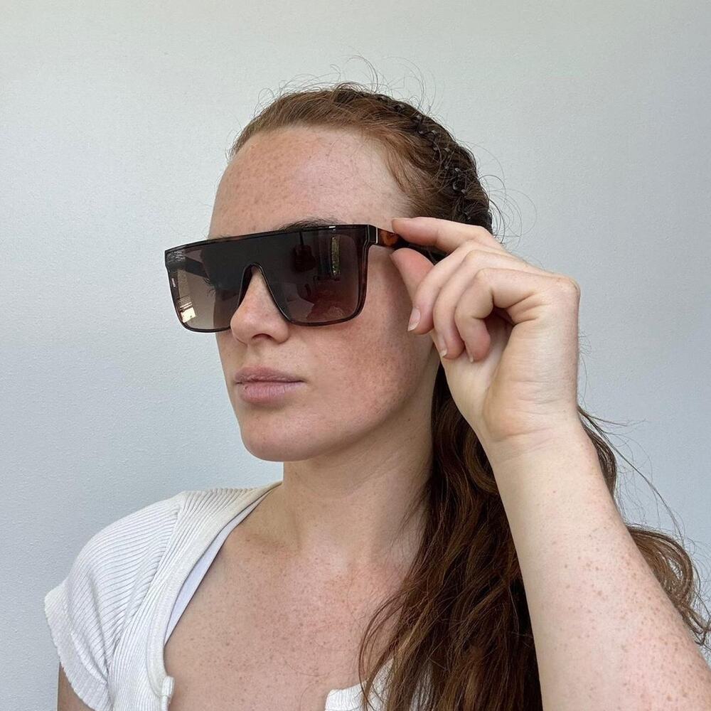 Brown tortoise shell oversized straight across sunglasses